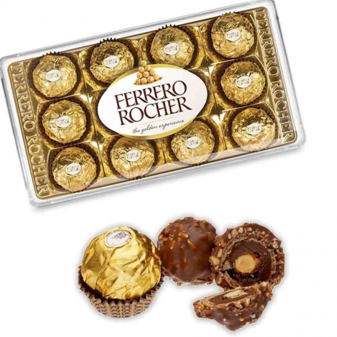 Bombom coberto com chocolate ao leite e pedaços de avelãs com recheio cremoso e avelã inteira.